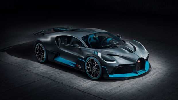 A sleek Bugatti Divo sports car is parked on a concrete floor, 4K Desktop Wallpaper