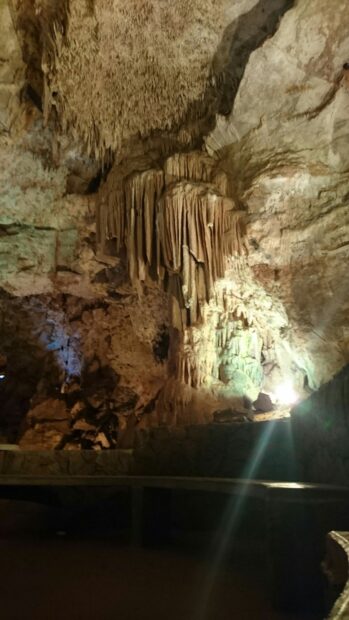 The formations inside Carlsbad Caverns National Park show detailed limestone structures with light, 4K Mobile Wallpaper