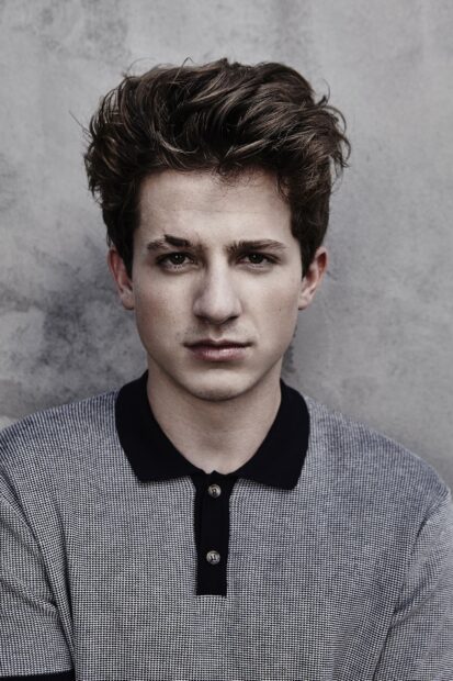 Charlie Puth wallpapers showing a close up of his face with a neutral expression, HD Phone Wallpaper