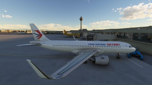 The China Eastern Airlines aircraft is parked beside the terminal building on a clear day, 4K Desktop Wallpaper