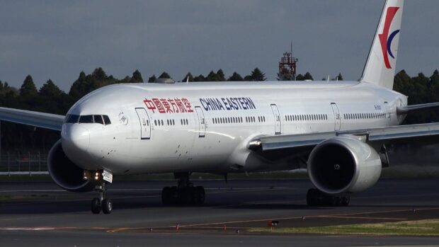 A China Eastern Airlines plane is taxiing on the airport runway before takeoff, HD Desktop Wallpaper