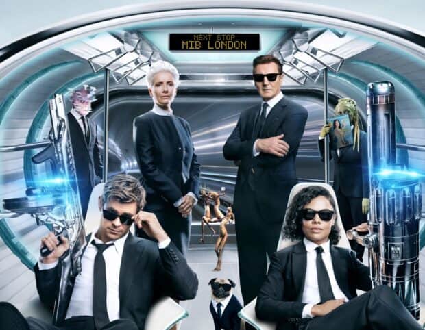 Chris Hemsworth and other Men In Black characters pose in a futuristic subway setting, HD Desktop Wallpaper
