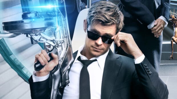 Chris Hemsworth holds a futuristic weapon while adjusting his sunglasses in a sci fi setting, 4K Desktop Wallpaper
