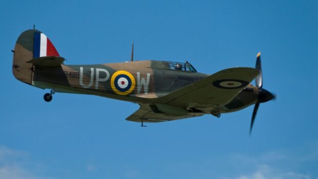 A classic Hawker Hurricane fighter plane flies against the clear blue sky, HD Desktop Wallpaper