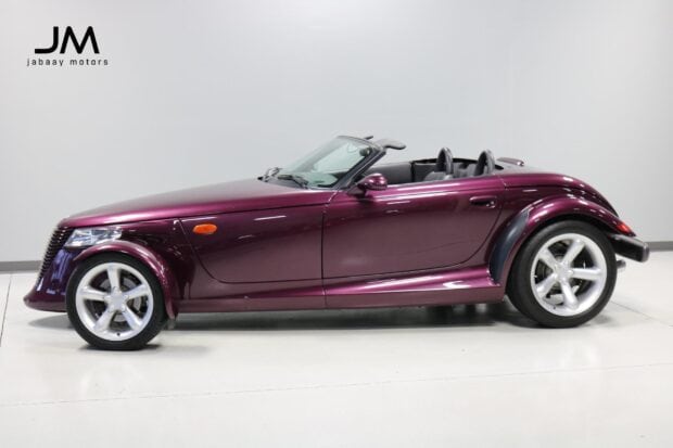 A purple Plymouth Prowler with a sleek convertible body is shown from the side view, HD Desktop Wallpaper