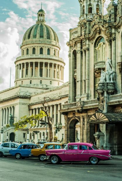 Classic cars are parked by historic buildings in Havana Cuba on a sunny day, HD Mobile Wallpaper