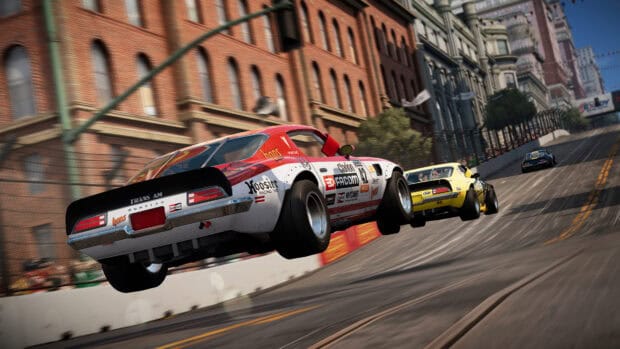 A classic car is airborne while racing on a city street circuit in racing game wallpapers, 4K Desktop Wallpaper