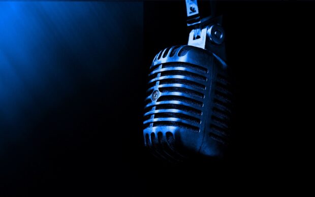 A classic microphone shines blue in the dark surrounded by shadows, HD Desktop Wallpaper