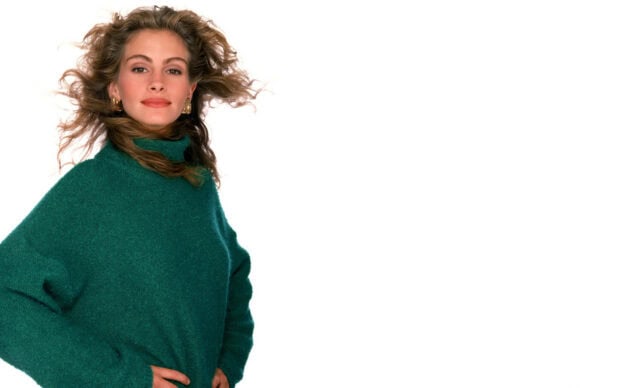 Julia Roberts Wallpapers showing a smiling woman wearing a green sweater with flowing hair, HD Desktop Wallpaper