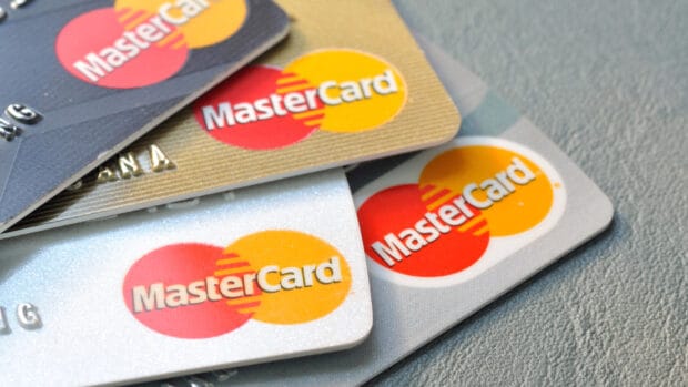 Mastercard logos are visible on several cards placed together, HD Desktop Wallpaper