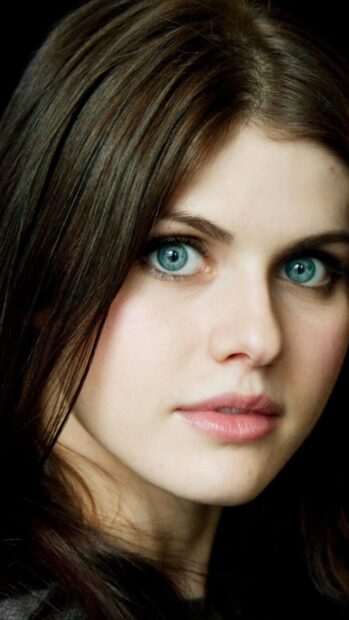 A close up of a woman showing striking blue eyes featured in Baywatch movie wallpapers, 4K Mobile Wallpaper