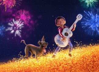 A boy is playing guitar with his dog under colorful fireworks in the night sky featuring Pixar Wallpapers, 4K Desktop Wallpaper