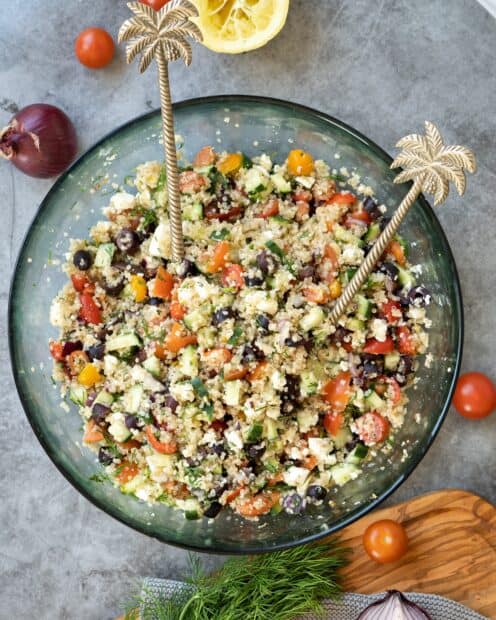 A bowl of quinoa salad with tomatoes cucumbers and olives, HD Mobile Wallpaper