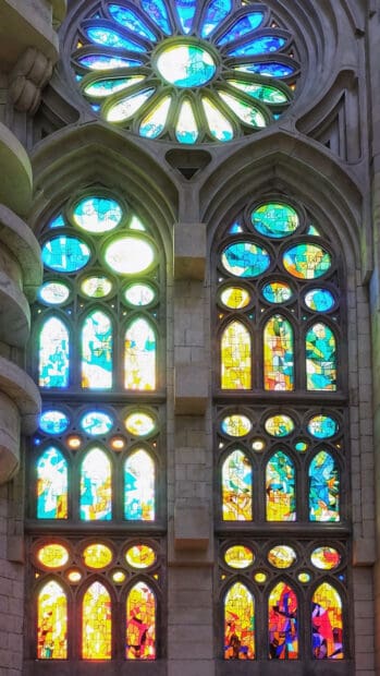 The stained glass windows inside Sagrada Familia show vivid colors and intricate designs, HD Mobile Wallpaper