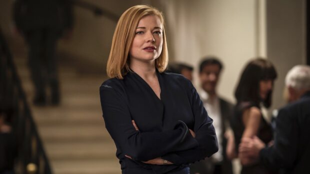 A confident woman stands with arms crossed in a formal setting featuring Sarah Snook Wallpapers, HD Desktop Wallpaper
