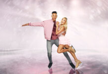 A couple is practicing ice dancing on a rink with bright effects, 2K Desktop Wallpaper