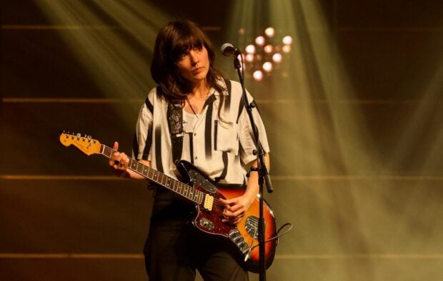 Courtney Barnett Wallpapers featuring a live music performance with warm lighting, HD Desktop Wallpaper