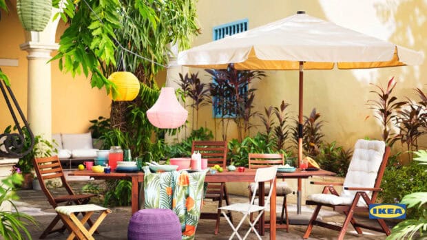 A cozy outdoor dining set surrounded by plants and colorful lanterns featuring Ikea Wallpapers, HD Desktop Wallpaper
