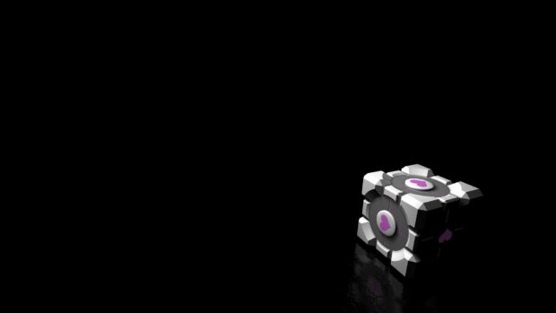 The cube with heart symbols is placed on a reflective black surface in a dark environment, HD Desktop Wallpaper