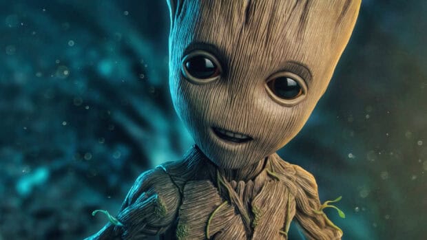 A close up of baby Groot with glowing eyes in a mystical forest, 2K Desktop Wallpaper