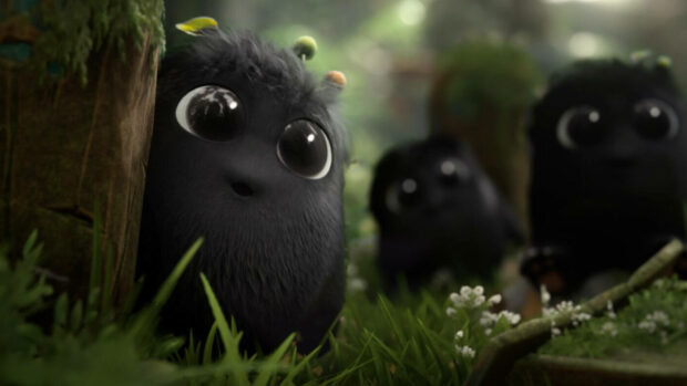 A close up of cute black spirit creatures from Kena Bridge of Spirits in a lush forest, HD Desktop Wallpaper