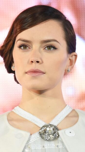 A close up portrait of Daisy Ridley with elegant makeup and jewelry, 4K Mobile Wallpaper