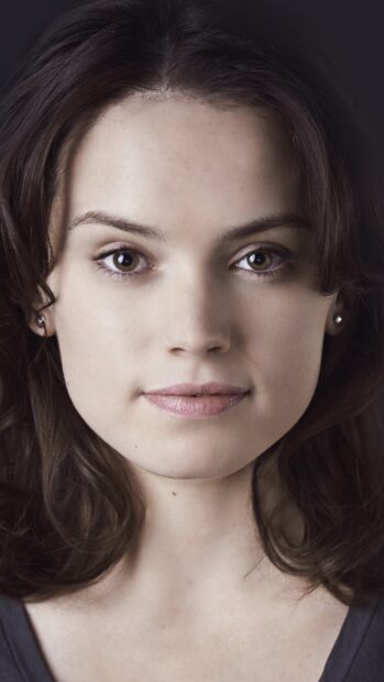 A close up portrait of Daisy Ridley with soft lighting and natural makeup, 4K Phone Wallpaper