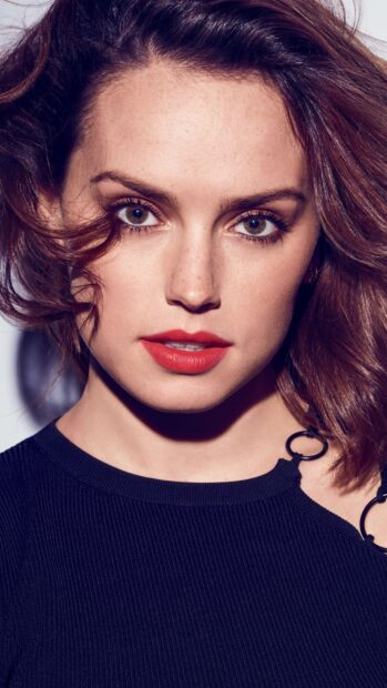 A close up portrait of Daisy Ridley with striking red lipstick and soft waves, HD Phone Wallpaper