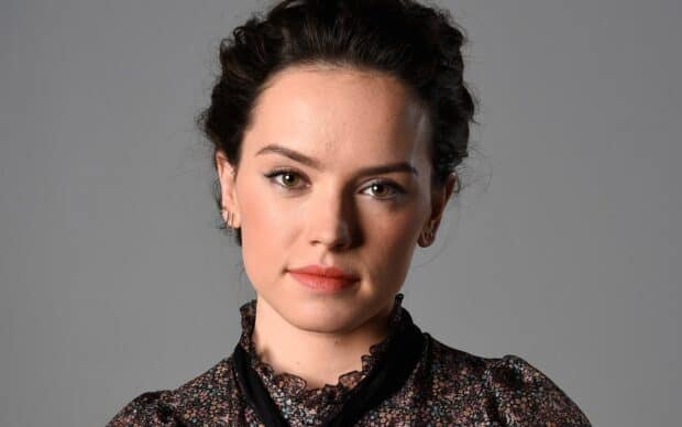 Daisy Ridley is shown wearing a floral blouse with a gray background, HD Desktop Wallpaper