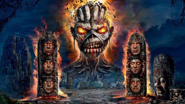 A dark scene featuring a fiery statue and burning stone faces in Iron Maiden Band, 2K Desktop Wallpaper