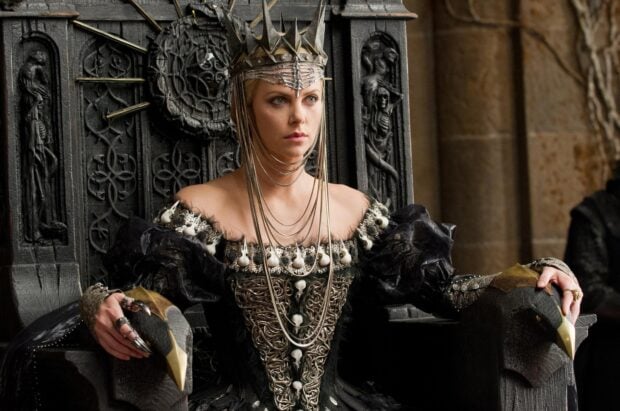 The dark queen sits on a throne in an ornate gown in Snow White and The Huntsman Wallpapers scene, HD Desktop Wallpaper