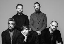 The Death Cab For Cutie band poses together in a black and white portrait, 2K Desktop Wallpaper