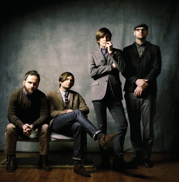 The members of Death Cab For Cutie pose together in a formal photo setting, HD Desktop Wallpaper