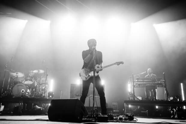 A black and white shot of Death Cab For Cutie performing live with instruments and lights, HD Desktop Wallpaper