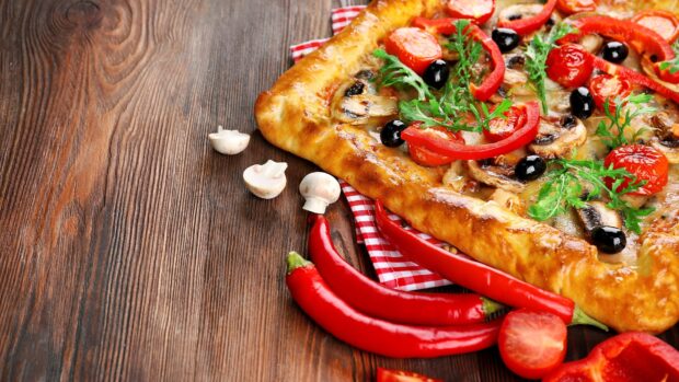 A close up of a dish with pizza topped with mushrooms, olives, and peppers, 4K Desktop Wallpaper