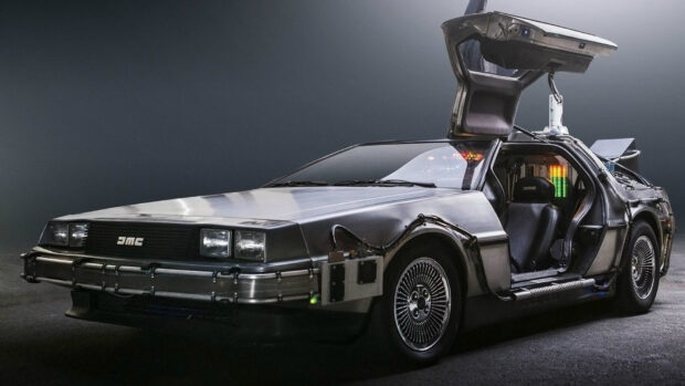 A Delorean Dmc 12 is shown with its gullwing door open and detailed exterior, HD Desktop Wallpaper