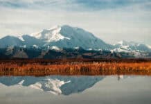 Snowy peaks reflect on calm water in Denali National Park And Preserve, HD Desktop Wallpaper