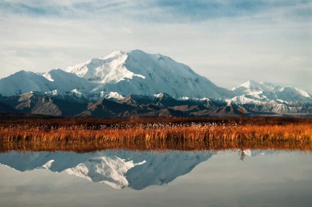 Snowy peaks reflect on calm water in Denali National Park And Preserve, HD Desktop Wallpaper