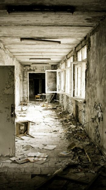 The hallway in the ghost town wallpapers shows broken furniture and scattered papers, HD Mobile Wallpaper