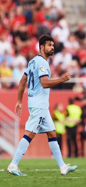 Diego Costa celebrates during a La Liga match wearing a light blue kit, 2K Phone Wallpaper
