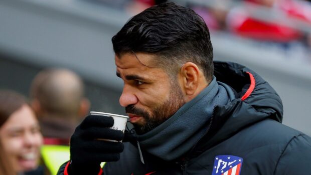 Diego Costa drinking coffee while wearing a jacket with Atletico Madrid logo, HD Desktop Wallpaper