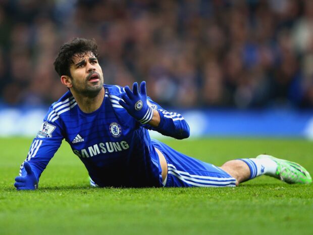 Diego Costa in a blue Chelsea kit lying on the grass during a football match, HD Desktop Wallpaper
