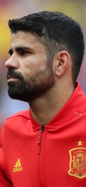 Diego Costa wallpapers showing a close up side profile wearing red Adidas jacket, 2K Mobile Wallpaper