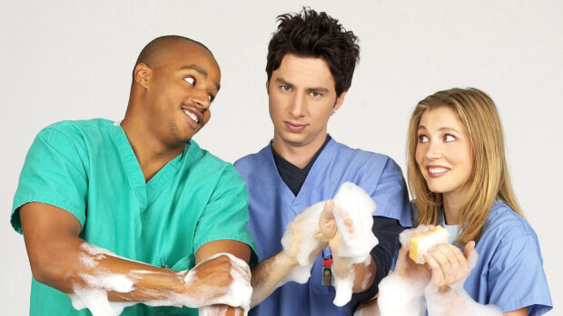 Donald Faison is seen with co stars washing hands covered in foam during a scene, HD Desktop Wallpaper