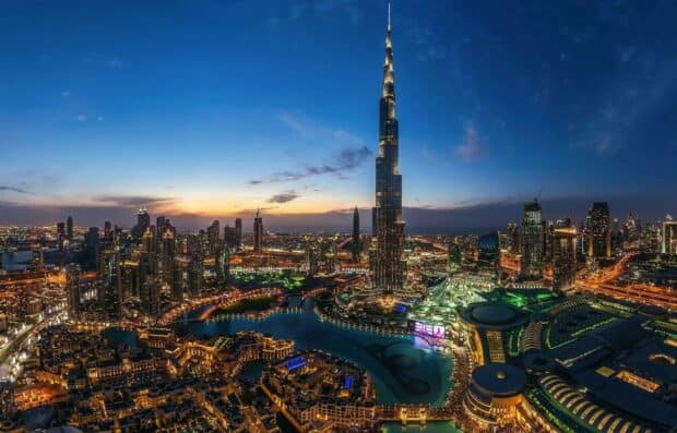 Dubai city skyline with Burj Khalifa illuminated during sunset in United Arab Emirates, HD Desktop Wallpaper