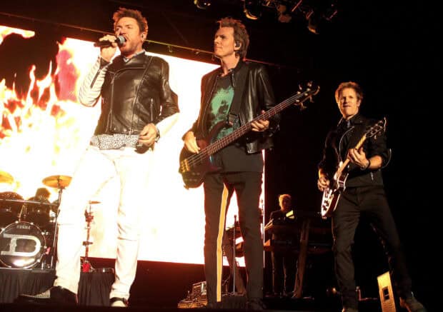 Duran Duran Wallpapers show energetic live concert with band members playing instruments, HD Desktop Wallpaper