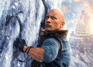 Dwayne Johnson climbing a snowy mountain with ice tools in a winter landscape, 4K Desktop Wallpaper
