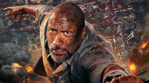 Dwayne Johnson appears in an intense action scene with a city and explosions behind him, HD Desktop Wallpaper