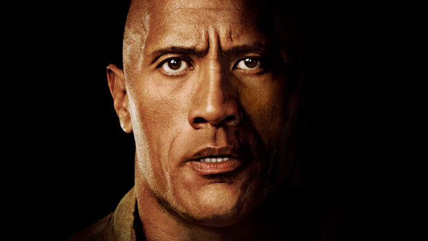 An intense close up of Dwayne Johnson showing detailed facial features and expression, 4K Desktop Wallpaper