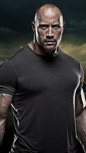 Dwayne Johnson stands firmly with a serious expression in this powerful image, HD Mobile Wallpaper